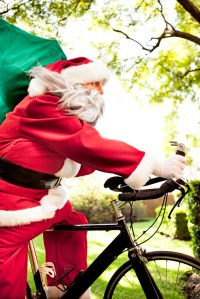 Santa racing on a bicycle